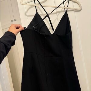 BCBG Generation black romper with pockets and adjustable straps